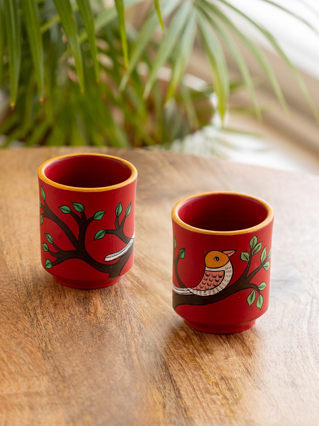 ExclusiveLane Red & Brown 2 Pieces Hand Painted Terracotta Matte Kulladhs - 200 ML Each
ExclusiveLane Red & Brown 2 Pieces Hand Painted Terracotta Matte Kulladhs - 200 ML Each