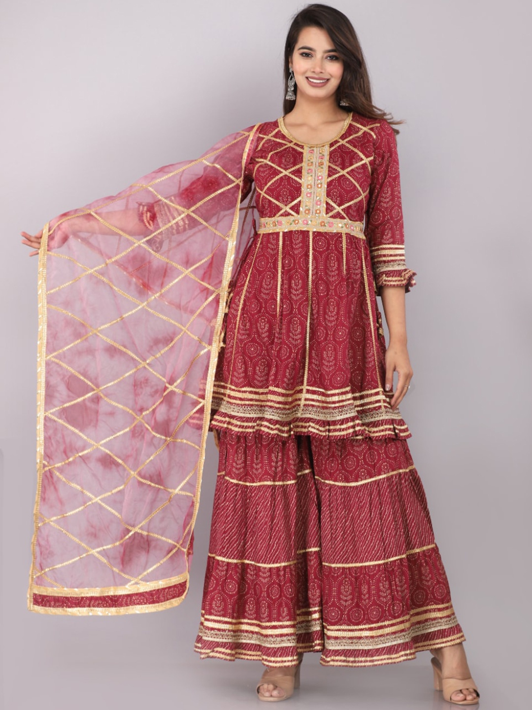 HIGHLIGHT FASHION EXPORT Ethnic Motifs Printed Gotta Patti Kurta & Sharara With Dupatta, Maroon
HIGHLIGHT FASHION EXPORT Ethnic Motifs Printed Gotta Patti Kurta & Sharara With Dupatta, Maroon