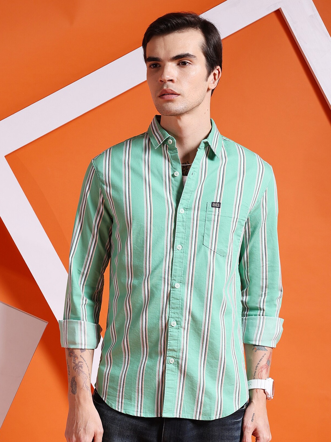 The Indian Garage Co Green Slim Fit Vertical Striped Spread Collar Cotton Casual Shirt
The Indian Garage Co Green Slim Fit Vertical Striped Spread Collar Cotton Casual Shirt