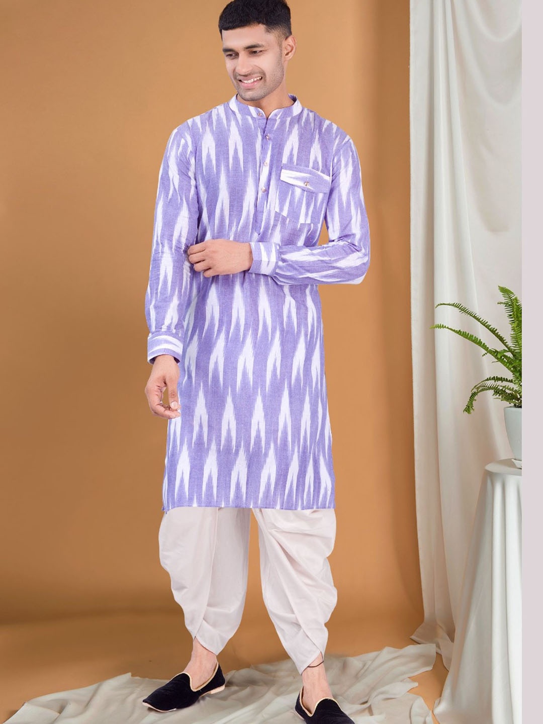 SHIWAM ETHNIX Geometric Printed Mandarin Collar Ikat Kurta With Dhoti Pants, Purple
SHIWAM ETHNIX Geometric Printed Mandarin Collar Ikat Kurta With Dhoti Pants, Purple