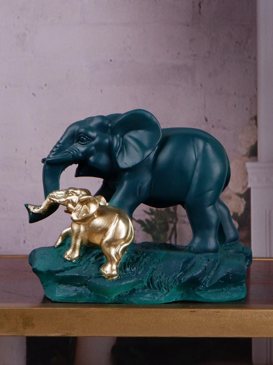 THE WHITE INK DECOR Green & Sliver Textured Elephant & Calf Polyresin Figurine Showpiece
THE WHITE INK DECOR Green & Sliver Textured Elephant & Calf Polyresin Figurine Showpiece