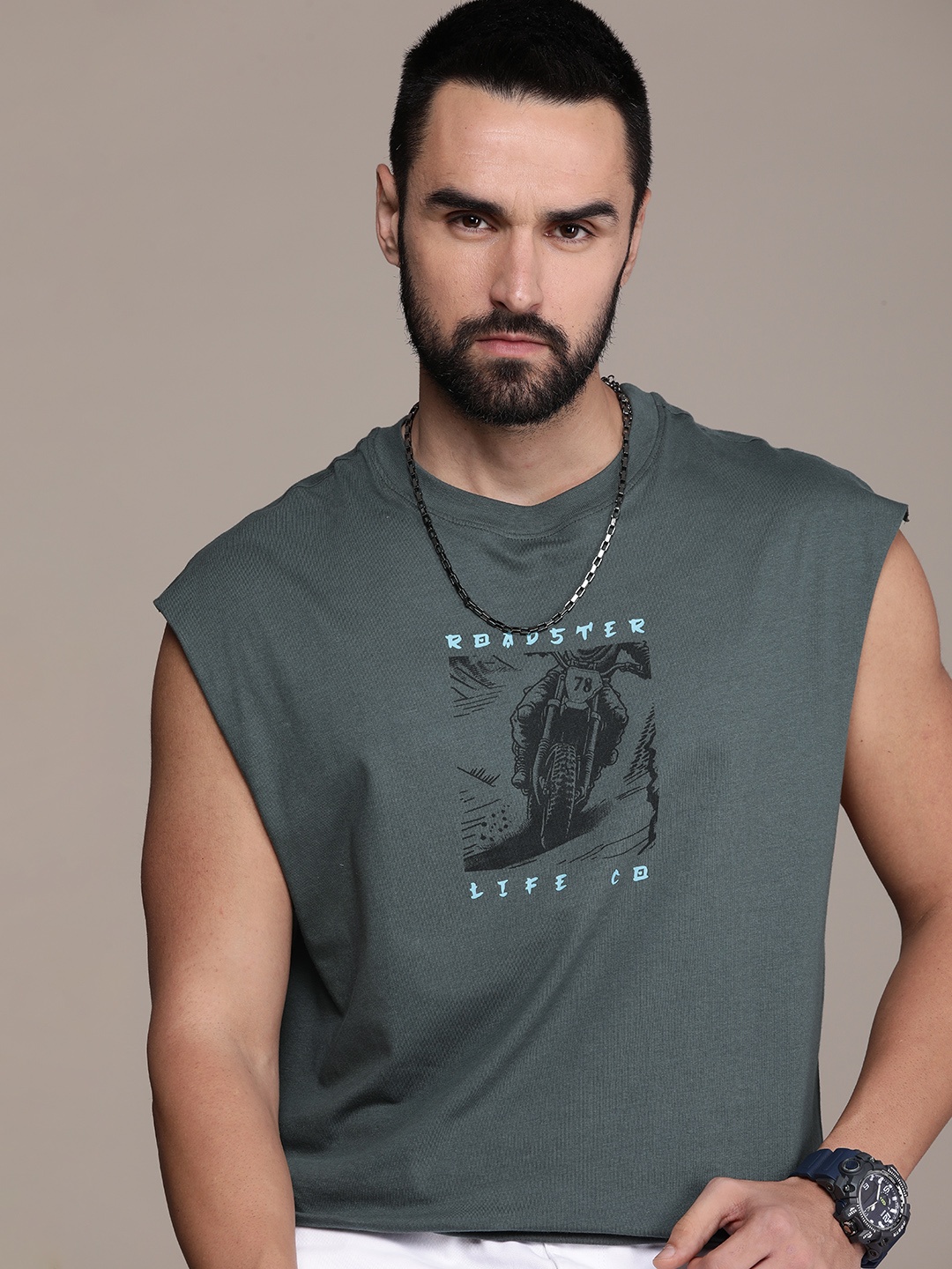 Roadster Men Brand Logo & Graphic Print Pure Cotton Relaxed Fit Sleeveless T-shirt, Green
Roadster Men Brand Logo & Graphic Print Pure Cotton Relaxed Fit Sleeveless T-shirt, Green
