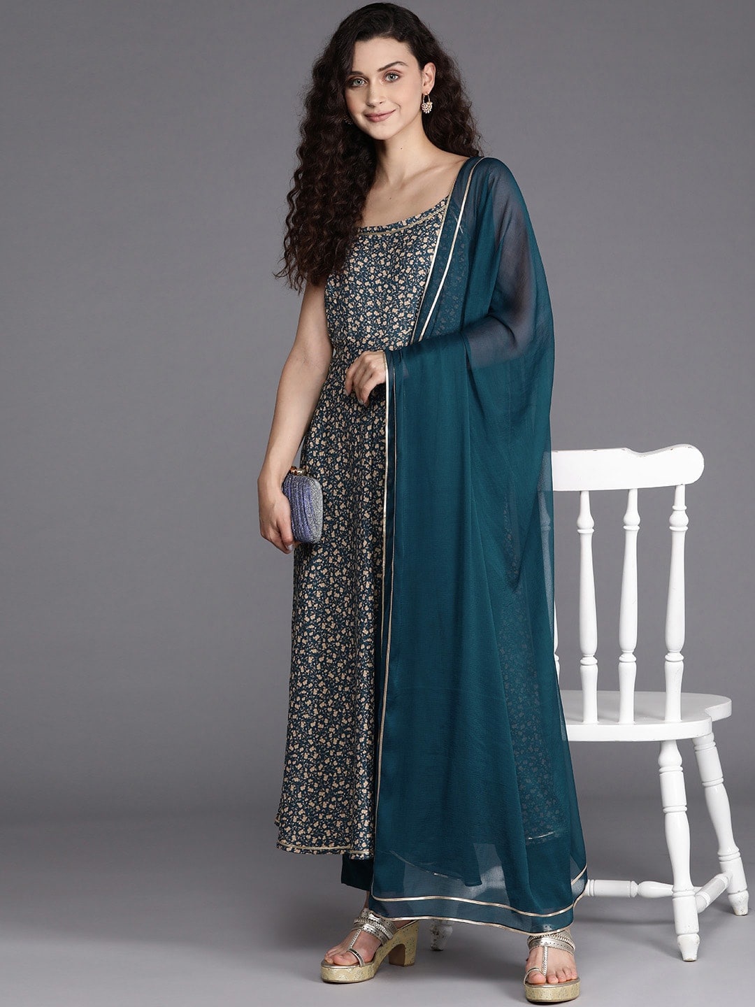 Inddus Floral Printed Shoulder Straps A-Line Kurta with Trousers & With Dupatta, Teal
Inddus Floral Printed Shoulder Straps A-Line Kurta with Trousers & With Dupatta, Teal