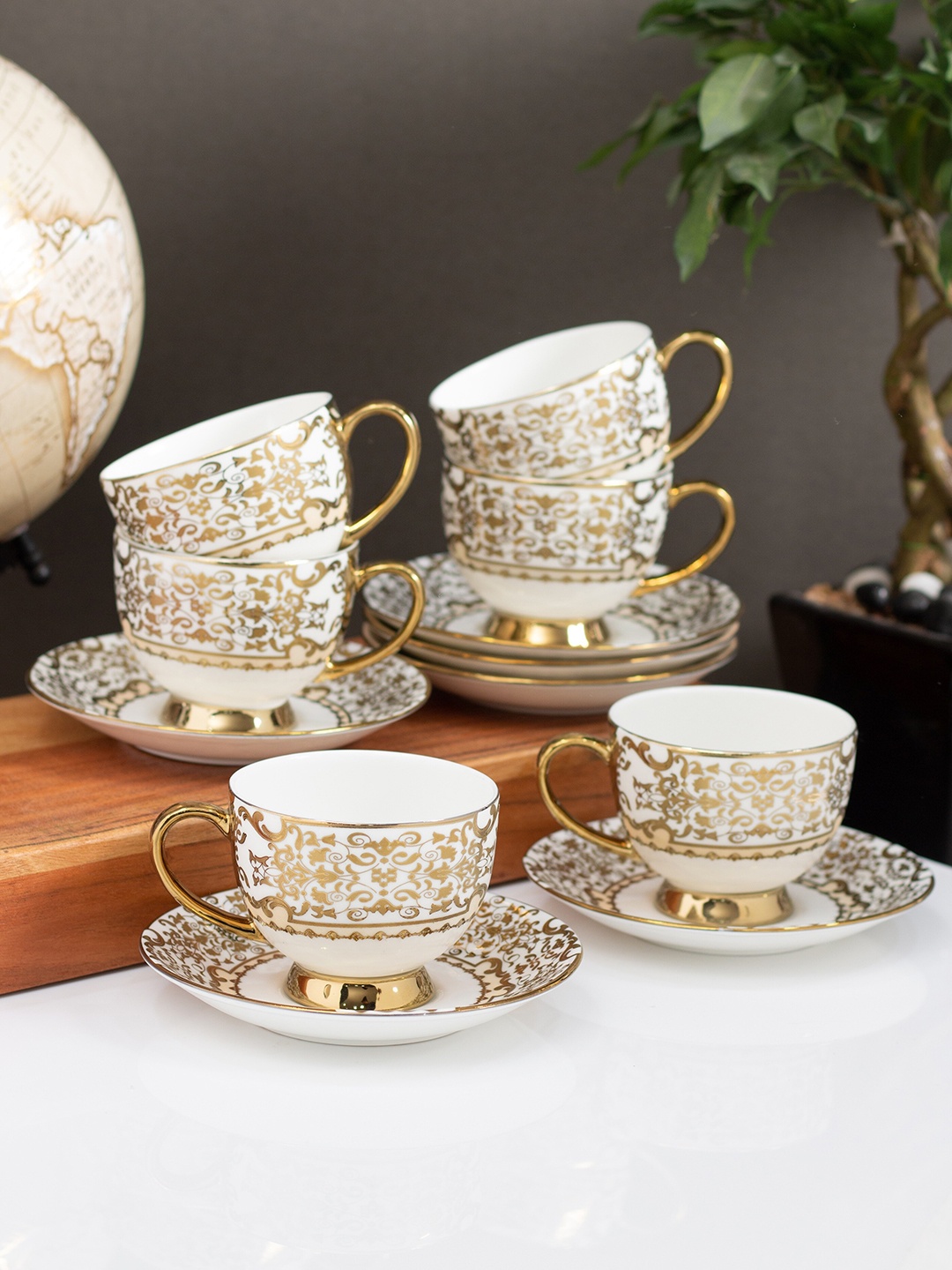 CLAY CRAFT White & Gold-Toned 12 Pieces Printed Ceramic Glossy Cups & Saucers 220 ml Each
CLAY CRAFT White & Gold-Toned 12 Pieces Printed Ceramic Glossy Cups & Saucers 220 ml Each