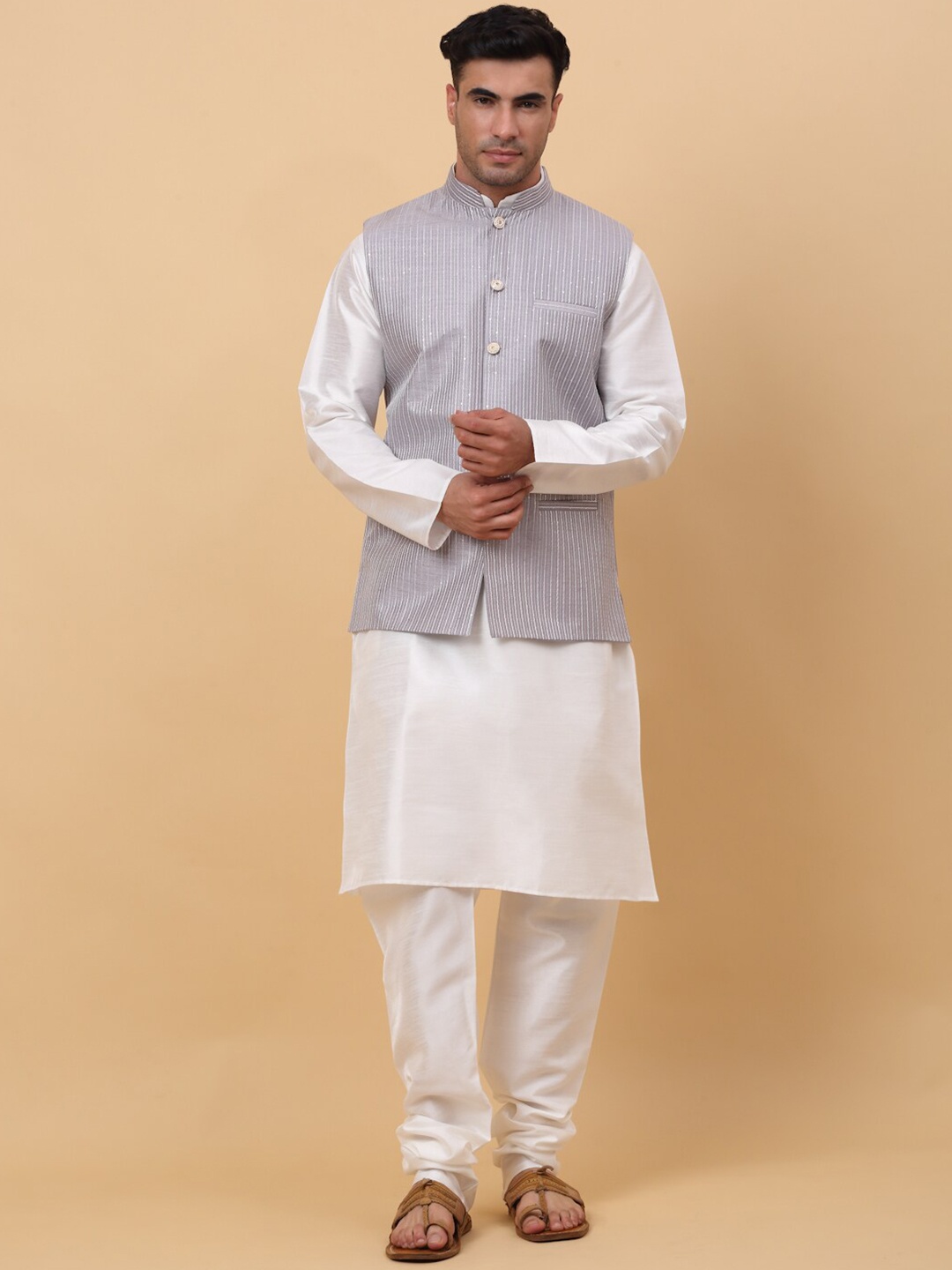 KRAFT INDIA Mandarin Collar Kurta With Churidar & Striped Sequinned Nehru Jacket, Cream
KRAFT INDIA Mandarin Collar Kurta With Churidar & Striped Sequinned Nehru Jacket, Cream