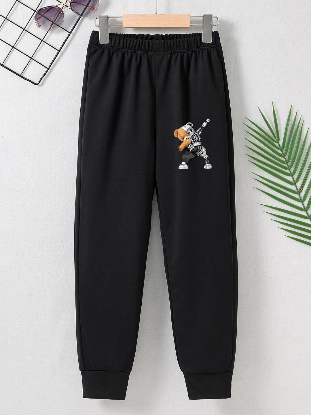 StyleCast Boys Black Original Mid-Rise Graphic Printed Joggers 
StyleCast Boys Black Original Mid-Rise Graphic Printed Joggers