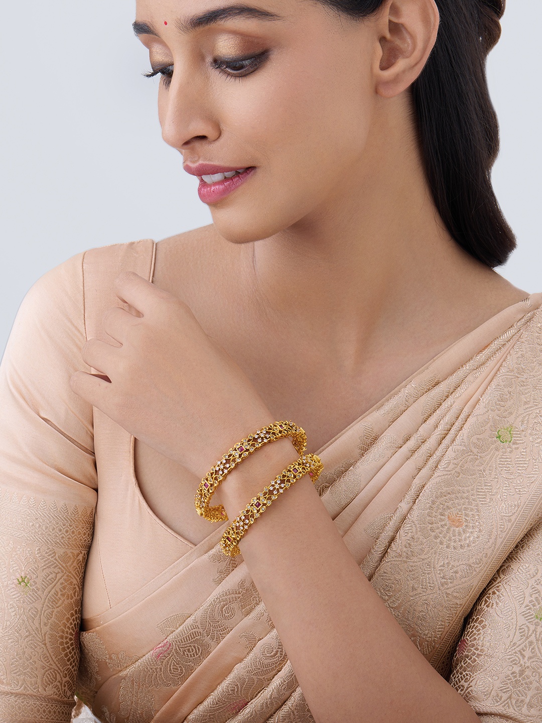 Kushal's Fashion Jewellery Set Of 2 Gold Plated Stones Studded Ethnic Antique Bangles
Kushal's Fashion Jewellery Set Of 2 Gold Plated Stones Studded Ethnic Antique Bangles