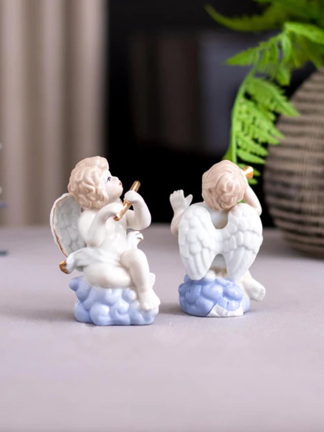 THEDECORKART 2 Pcs White & Blue Ceramic Angelic Musician Figurine Showpieces
THEDECORKART 2 Pcs White & Blue Ceramic Angelic Musician Figurine Showpieces