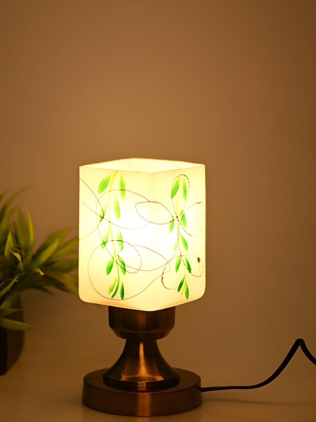 Afast Green & Gold Toned Textured Contemporary Glass Table Lamp with Adjustable Cord 
Afast Green & Gold Toned Textured Contemporary Glass Table Lamp with Adjustable Cord