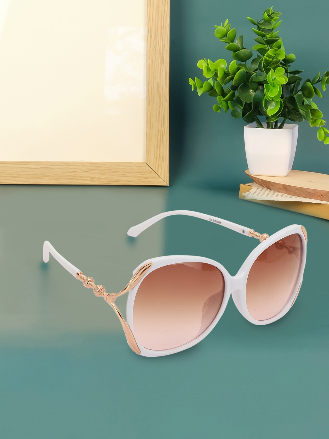 Carlton London Premium Women Oversized Sunglasses with UV Protected Lens CLSW286, White
Carlton London Premium Women Oversized Sunglasses with UV Protected Lens CLSW286, White