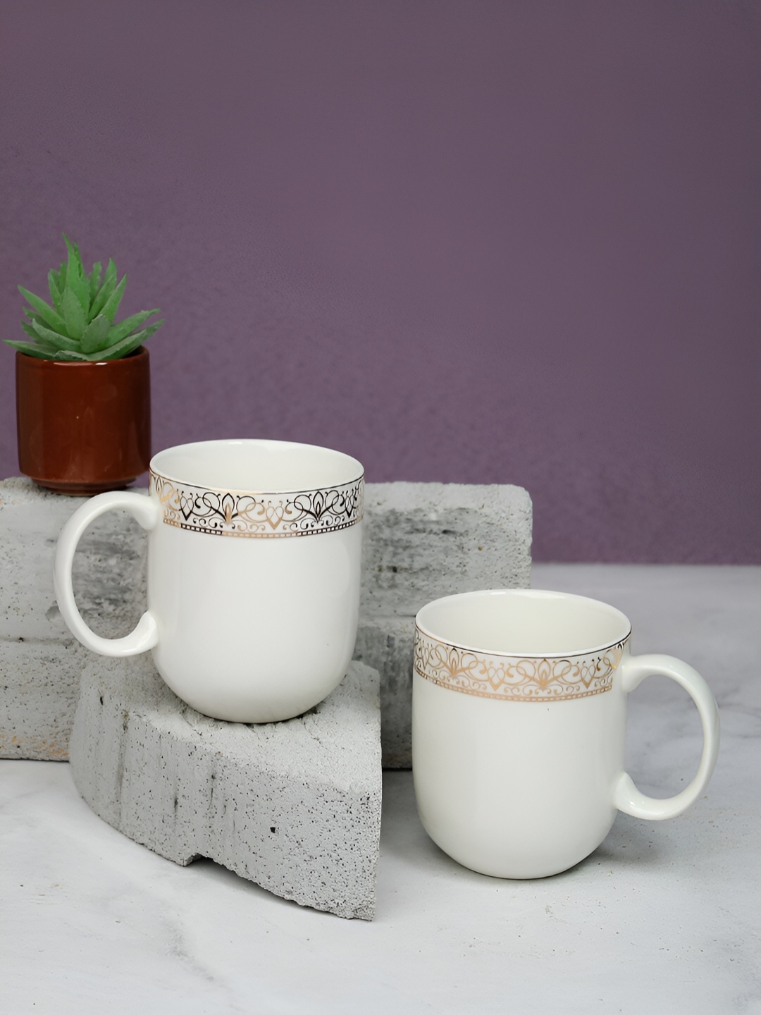 Vola Global LLP Sparkle White 2 Pieces Porcelain With Golden Border Glossy Cups 200 ML
Vola Global LLP Sparkle White 2 Pieces Porcelain With Golden Border Glossy Cups 200 ML