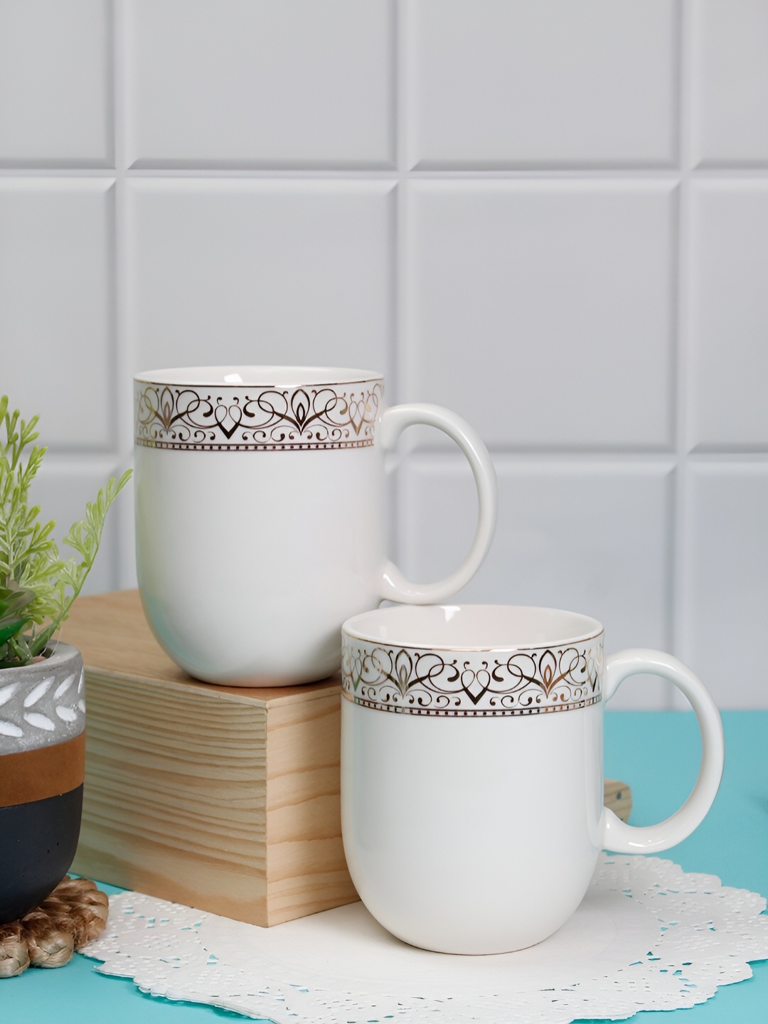 Vola Global LLP Dazzle White 2 pieces Porcelain With Golden Border Glossy Cups 300 ML Each
Vola Global LLP Dazzle White 2 pieces Porcelain With Golden Border Glossy Cups 300 ML Each