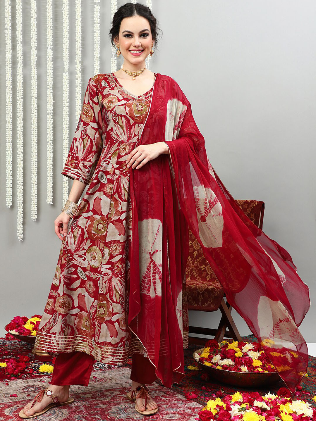 Vastramyaa Floral Printed Regular Beads and Stones Pure Silk Kurta With Trousers & Dupatta, Maroon
Vastramyaa Floral Printed Regular Beads and Stones Pure Silk Kurta With Trousers & Dupatta, Maroon