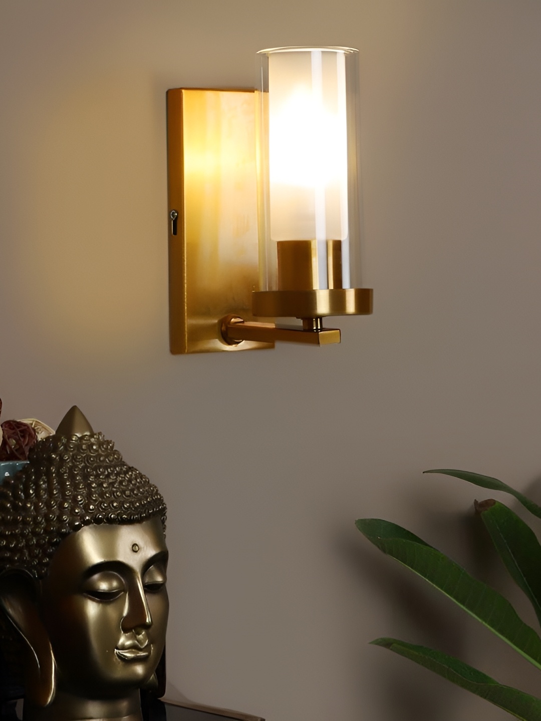 ELIANTE Gold-Toned & Transparent Contemporary Cylindrical Shaped Iron Wall Lamp
ELIANTE Gold-Toned & Transparent Contemporary Cylindrical Shaped Iron Wall Lamp