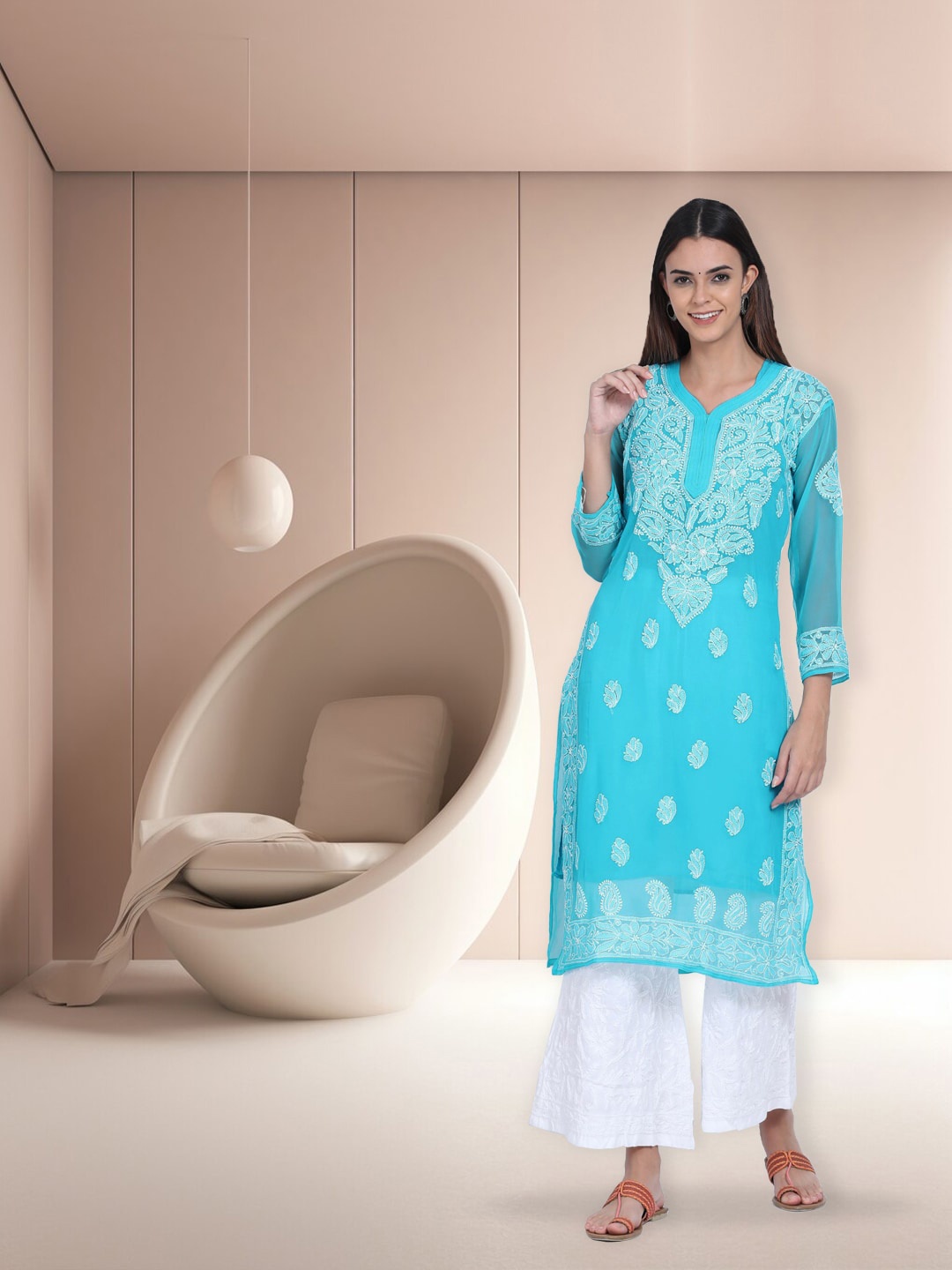 PARAMOUNT CHIKAN Ethnic Motifs Embroidered Chikankari Georgette Kurta With Slip, Turquoise blue
PARAMOUNT CHIKAN Ethnic Motifs Embroidered Chikankari Georgette Kurta With Slip, Turquoise blue