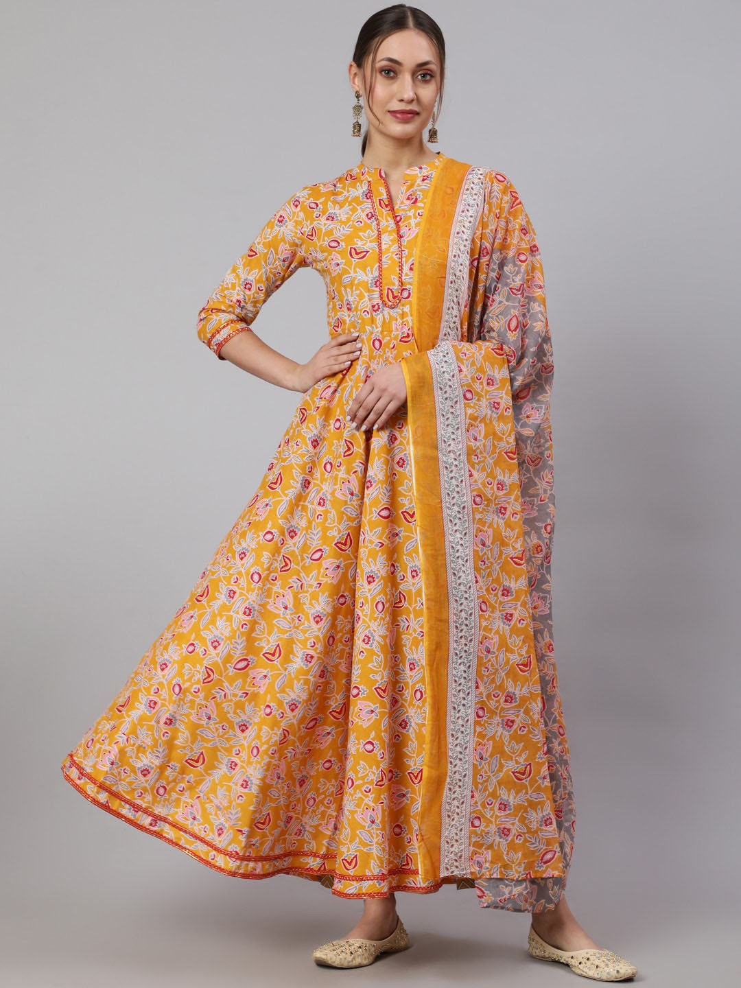 WOMENCLICK Floral Printed Gotta Patti Pure Cotton Anarkali Kurta With Trousers & Dupatta, Mustard
WOMENCLICK Floral Printed Gotta Patti Pure Cotton Anarkali Kurta With Trousers & Dupatta, Mustard