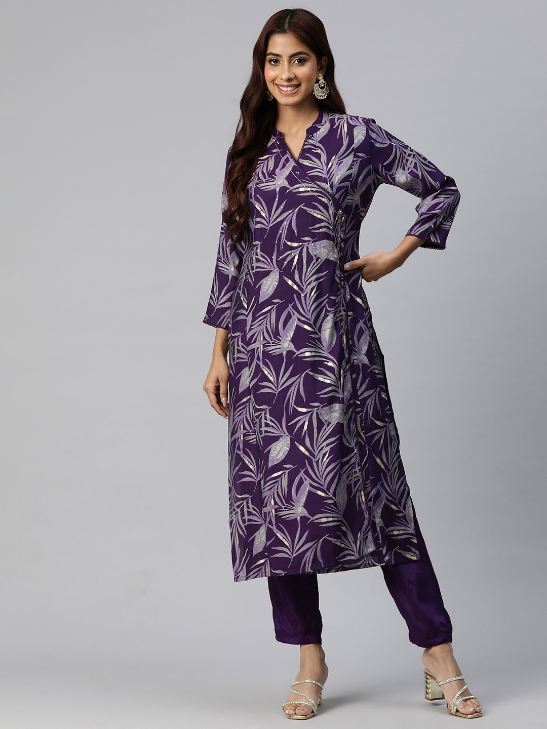Readiprint Fashions Women Floral Printed Angrakha Sequinned Pure Silk Kurta with Trousers, Violet
Readiprint Fashions Women Floral Printed Angrakha Sequinned Pure Silk Kurta with Trousers, Violet