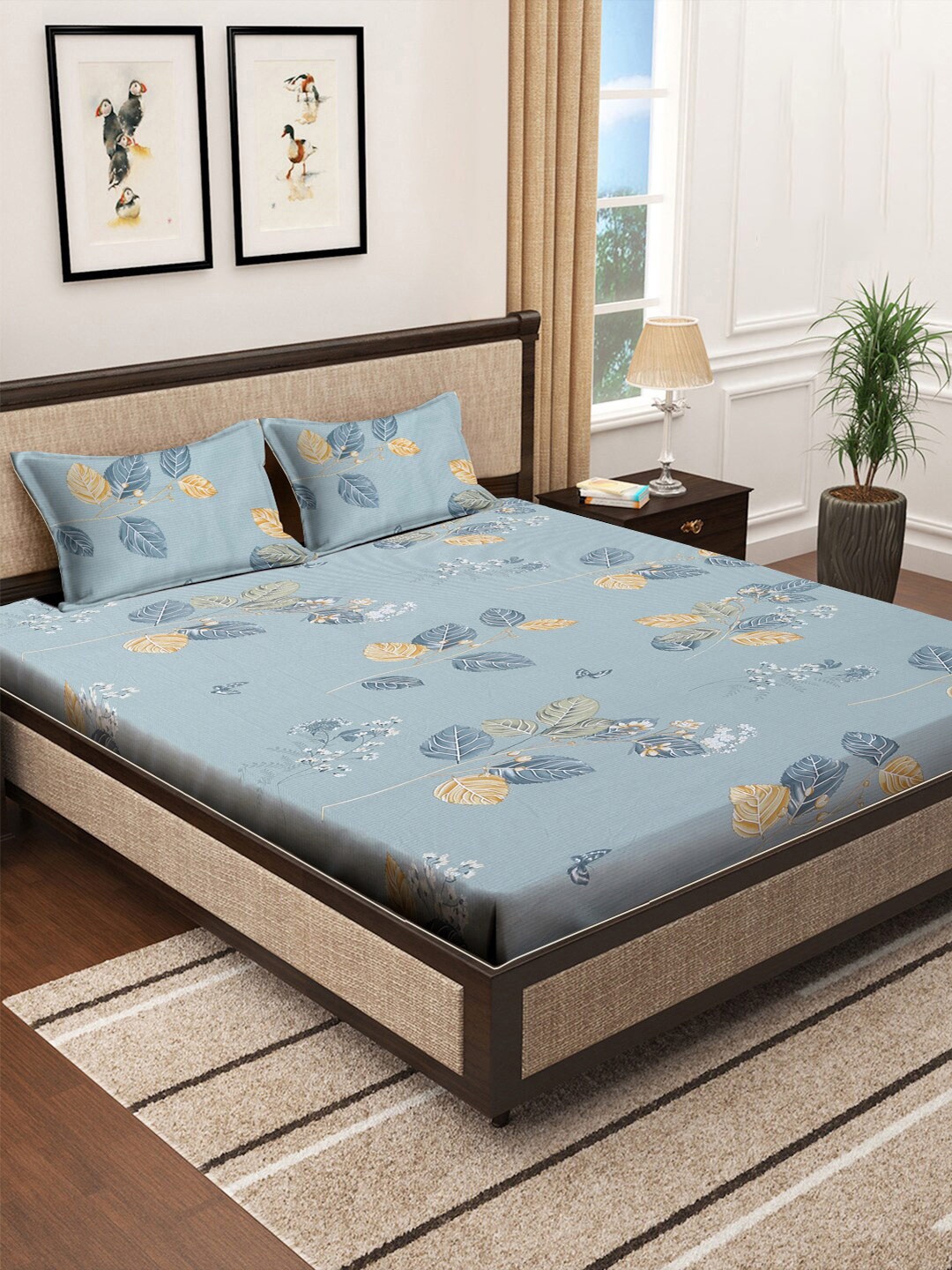 KLOTTHE Blue & Yellow Floral Cotton 400 TC King Fitted Bedsheet With 2 Pillow Covers
KLOTTHE Blue & Yellow Floral Cotton 400 TC King Fitted Bedsheet With 2 Pillow Covers