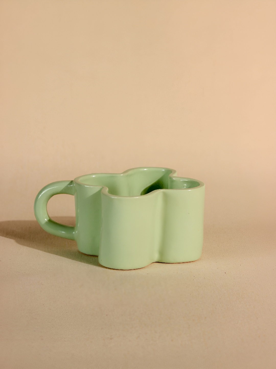 The Orby House Green Handcrafted and Hand Painted Textured Ceramic Glossy Cups and Mugs
The Orby House Green Handcrafted and Hand Painted Textured Ceramic Glossy Cups and Mugs