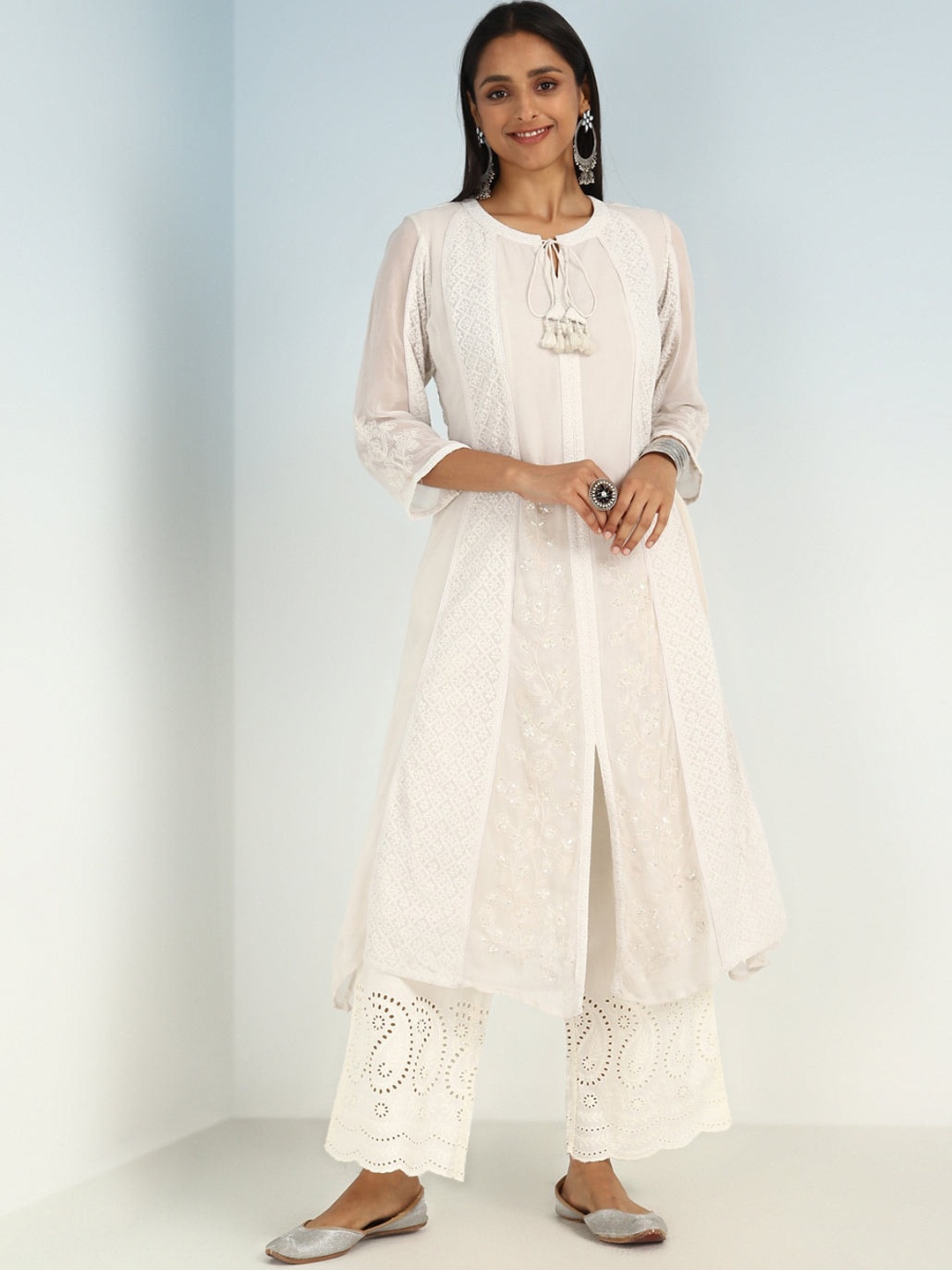 Lakshita Floral Embroidered Tie-Up Neck Sequinned Georgette Layered A-Line Kurta, Off white
Lakshita Floral Embroidered Tie-Up Neck Sequinned Georgette Layered A-Line Kurta, Off white