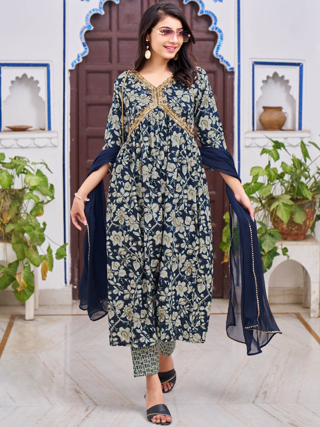 KALINI Floral Printed Thread Work Detailed Empire A-Line Kurta & Trouser With Dupatta, Navy blue
KALINI Floral Printed Thread Work Detailed Empire A-Line Kurta & Trouser With Dupatta, Navy blue