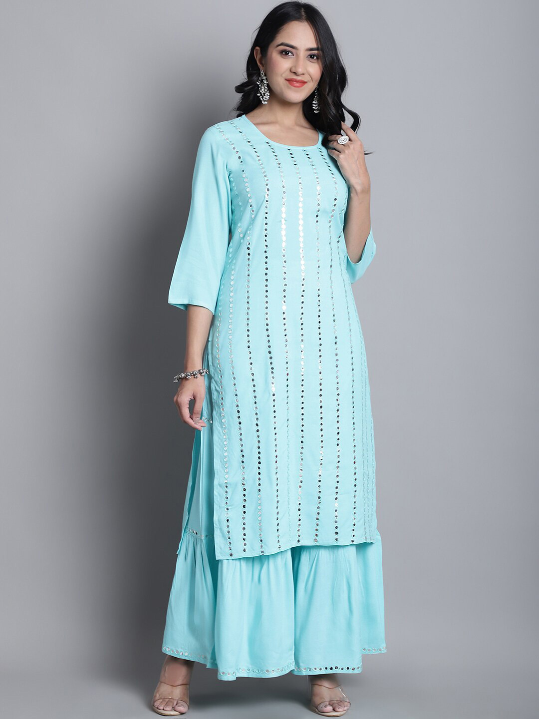 KALINI Geometric Embroidered Mirror Work Straight Kurta with Sharara, Turquoise blue
KALINI Geometric Embroidered Mirror Work Straight Kurta with Sharara, Turquoise blue