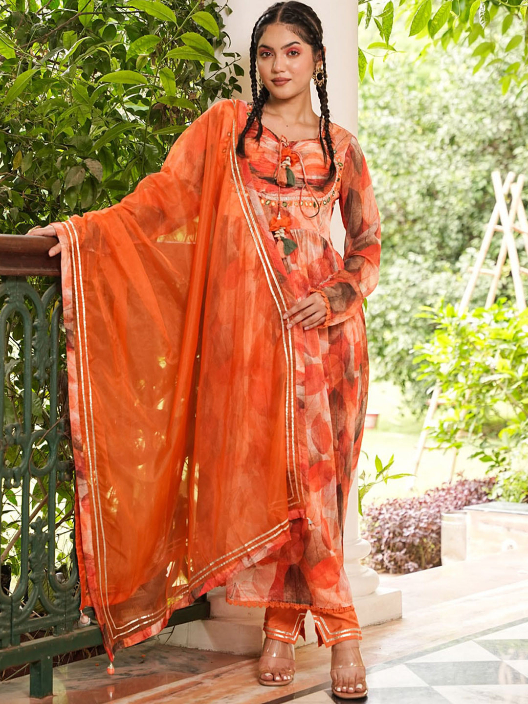 FASHION DWAR Ethnic Motifs Printed Pleated Mirror Work Kurta With Trousers & Dupatta, Orange
FASHION DWAR Ethnic Motifs Printed Pleated Mirror Work Kurta With Trousers & Dupatta, Orange