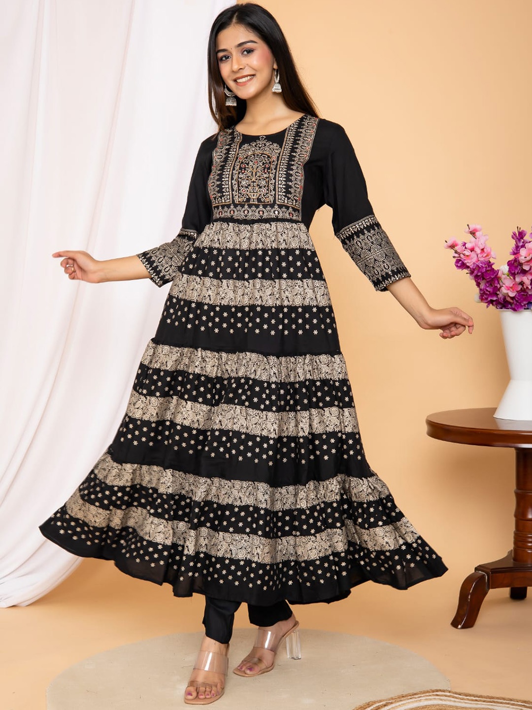WEAVERS SAGA Ethnic Motifs Printed Mirror Work Pure Cotton Anarkali Kurta Set, Black
WEAVERS SAGA Ethnic Motifs Printed Mirror Work Pure Cotton Anarkali Kurta Set, Black