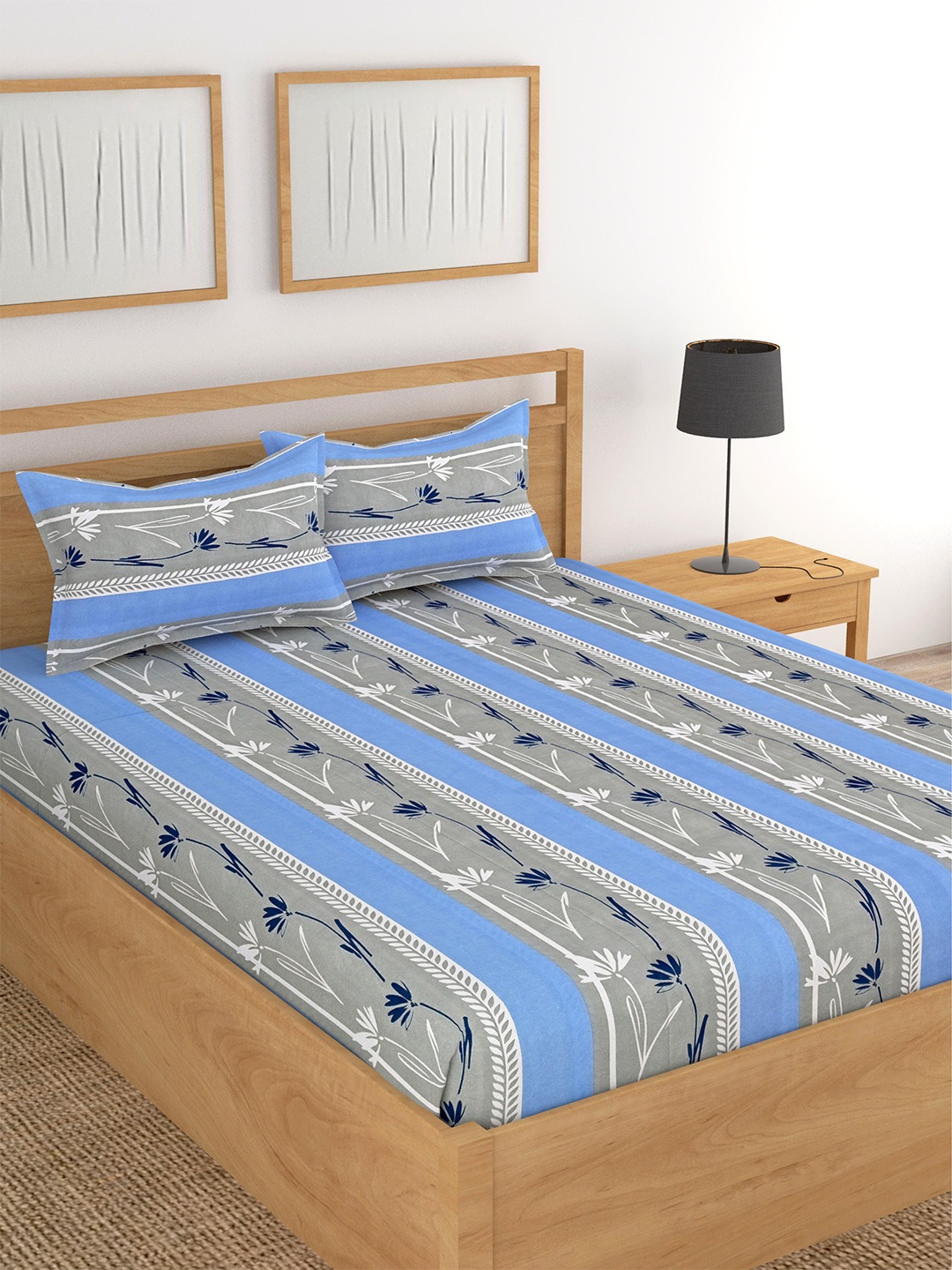 Lali Prints Blue & Grey Floral Printed Cotton 180 TC King Bedsheet with 2 Pillow Covers
Lali Prints Blue & Grey Floral Printed Cotton 180 TC King Bedsheet with 2 Pillow Covers