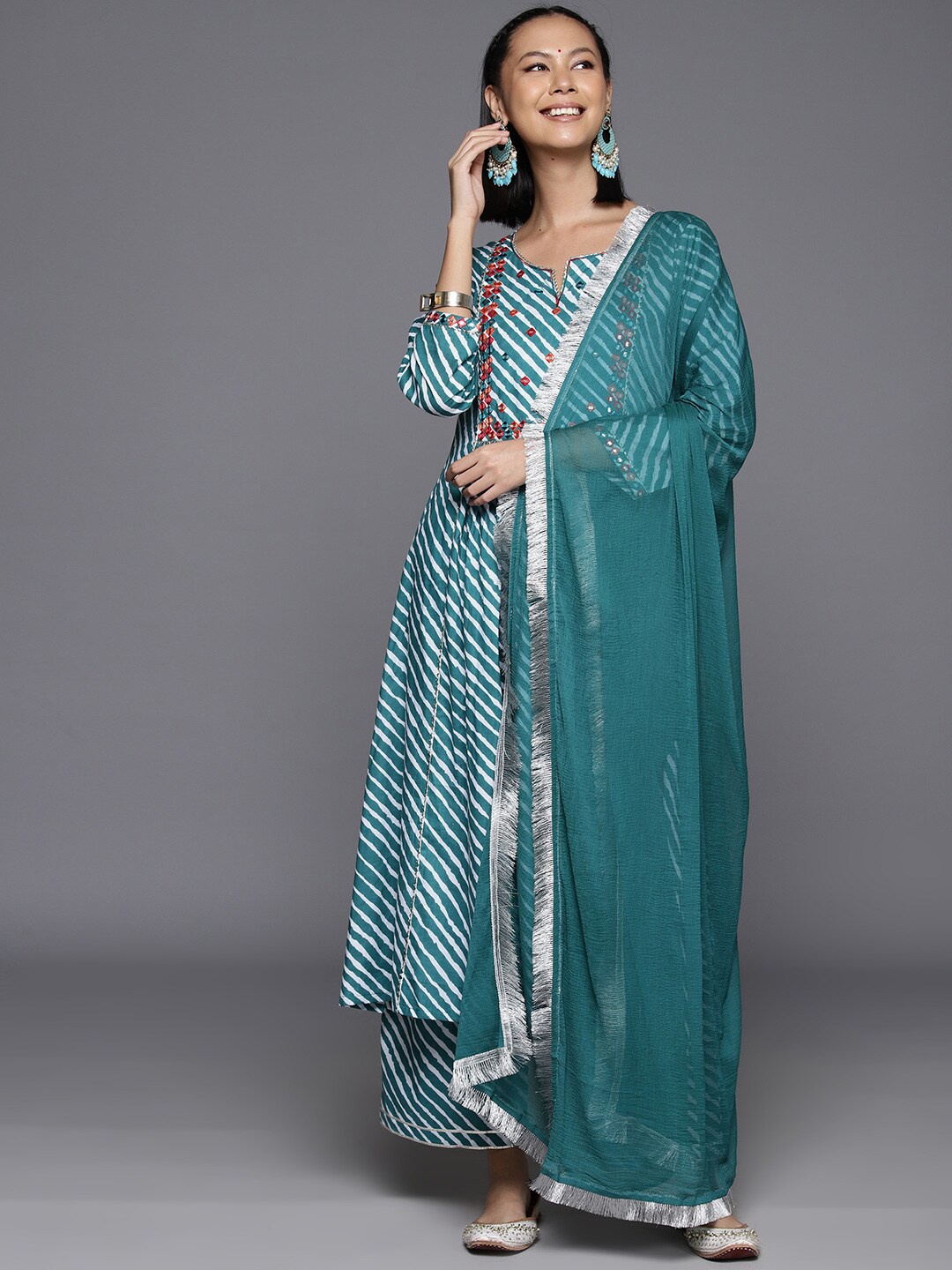 KALINI Leheriya Printed Empire Mirror Work Pure Cotton Kurta With Trousers & Dupatta, Turquoise blue
KALINI Leheriya Printed Empire Mirror Work Pure Cotton Kurta With Trousers & Dupatta, Turquoise blue