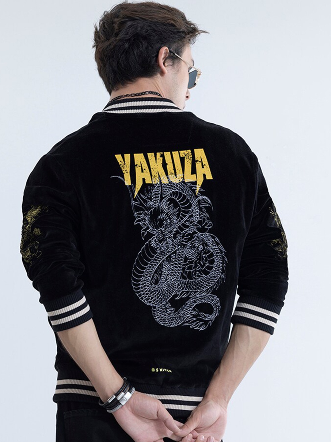 Snitch Black Graphic Printed Stand Collar Long Sleeve Zip Detail Cotton Bomber Jacket
Snitch Black Graphic Printed Stand Collar Long Sleeve Zip Detail Cotton Bomber Jacket