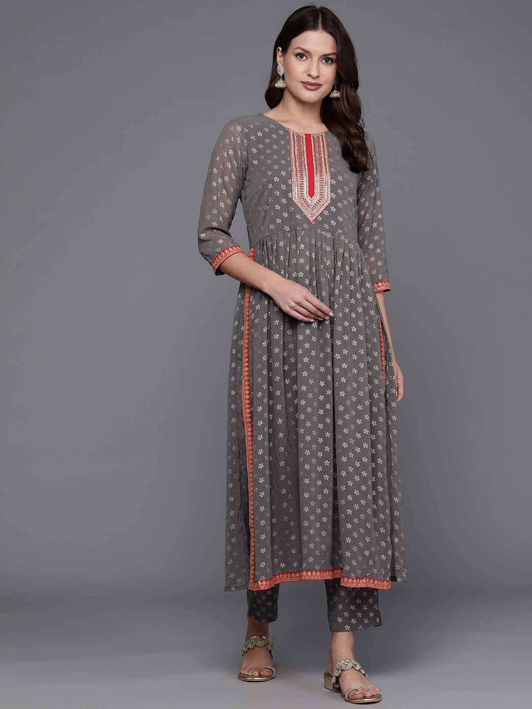 Ahalyaa Women Ethnic Motifs Printed Pleated Sequinned Kurta with Trousers, Grey
Ahalyaa Women Ethnic Motifs Printed Pleated Sequinned Kurta with Trousers, Grey