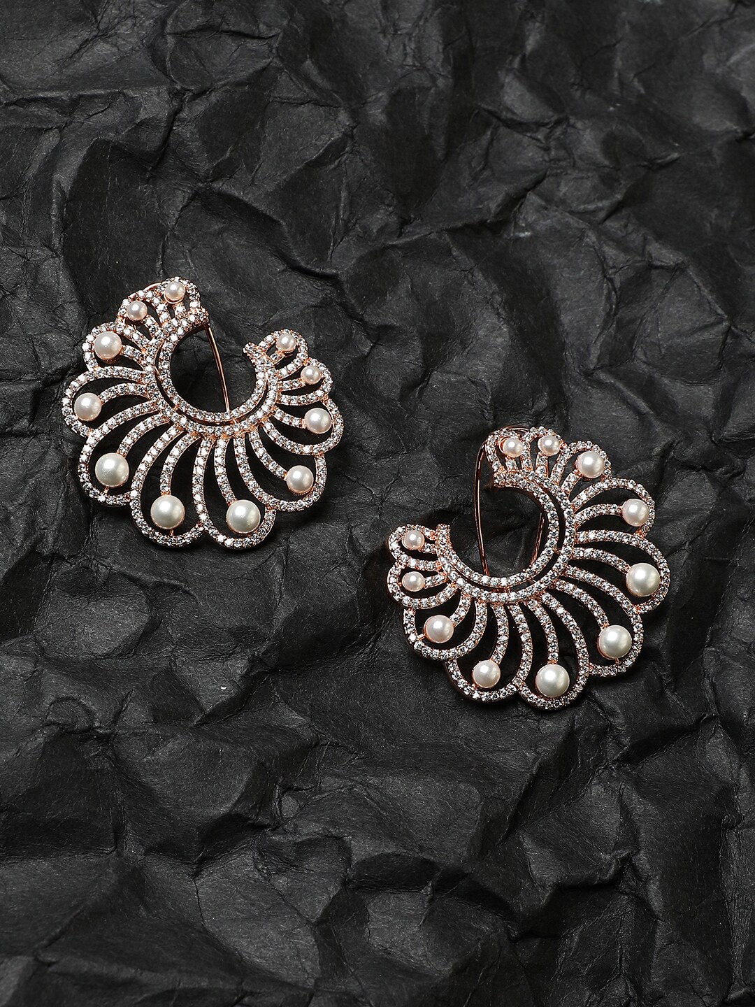 Anouk Gold-Toned & White Gold-Plated Stones Studded & Pearls Beaded Swirl Drop Earrings
Anouk Gold-Toned & White Gold-Plated Stones Studded & Pearls Beaded Swirl Drop Earrings