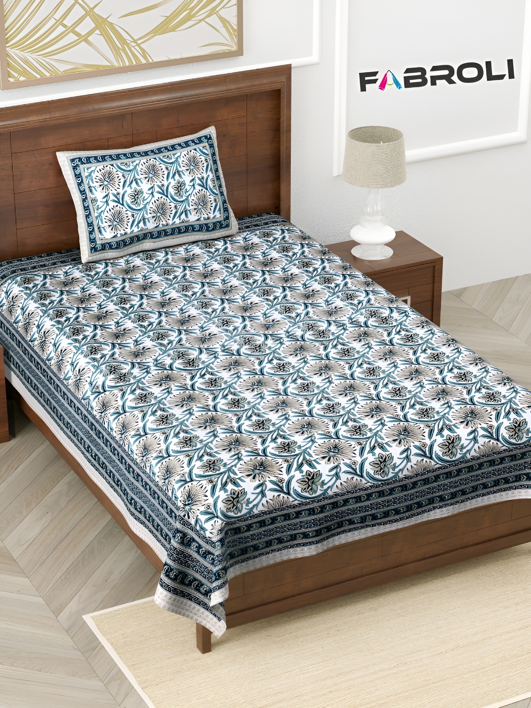 FABROLI Blue & White 130 GSM Floral Cotton 240 TC Single Bedsheet with 1 Pillow Cover
FABROLI Blue & White 130 GSM Floral Cotton 240 TC Single Bedsheet with 1 Pillow Cover