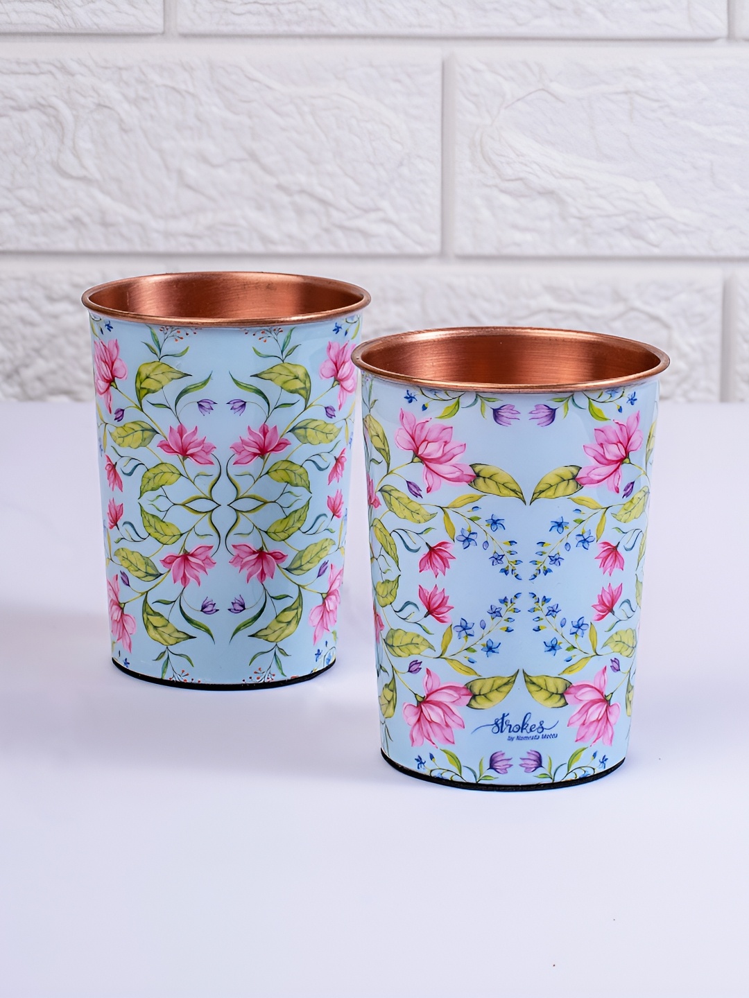 Strokes by Namrata Mehta Blue & Pink 2 Pcs Floral Copper Water or Juice Glass 200 ml
Strokes by Namrata Mehta Blue & Pink 2 Pcs Floral Copper Water or Juice Glass 200 ml