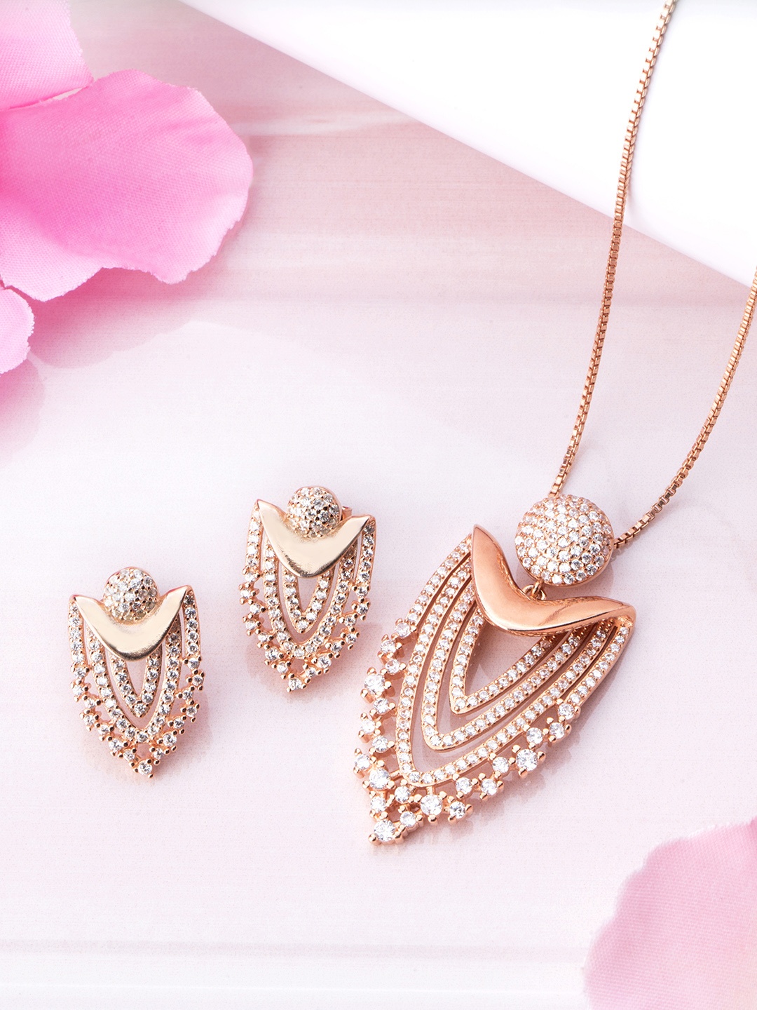 Zavya Women Rose Gold-Plated CZ Studded Sterling Silver Necklace with Earrings
Zavya Women Rose Gold-Plated CZ Studded Sterling Silver Necklace with Earrings