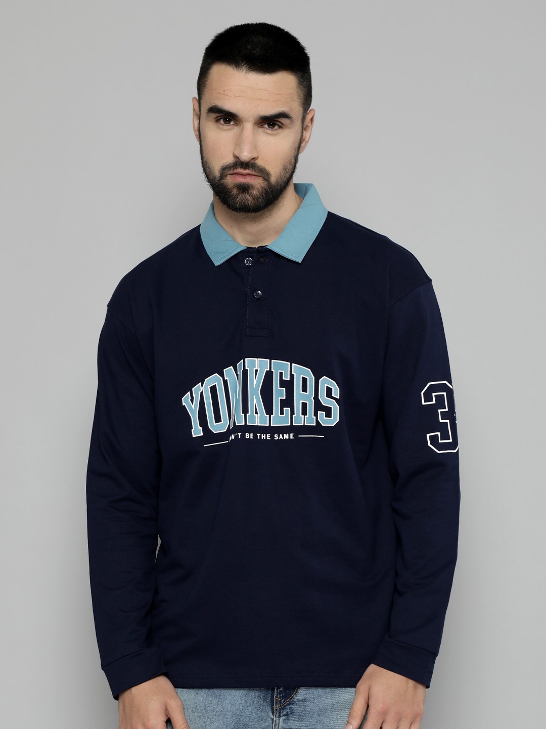 Maniac Typography Printed Polo Collar Long Drop Shoulder Sleeves Cotton Oversized T-shirt, Navy blue
Maniac Typography Printed Polo Collar Long Drop Shoulder Sleeves Cotton Oversized T-shirt, Navy blue