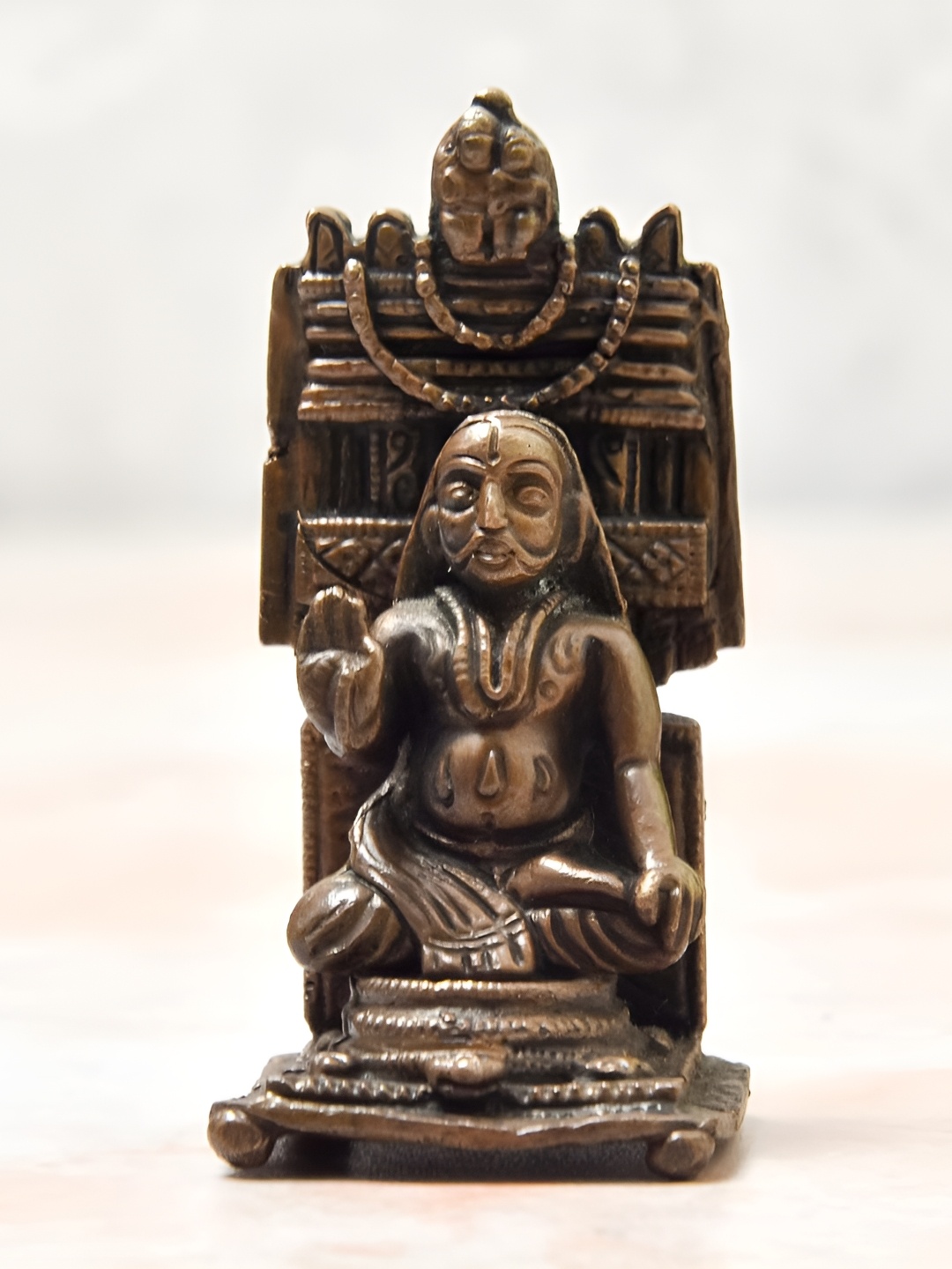 Bhimonee Decor Copper-Toned &Brown Ragvendra Swamy Idol Showpiece
