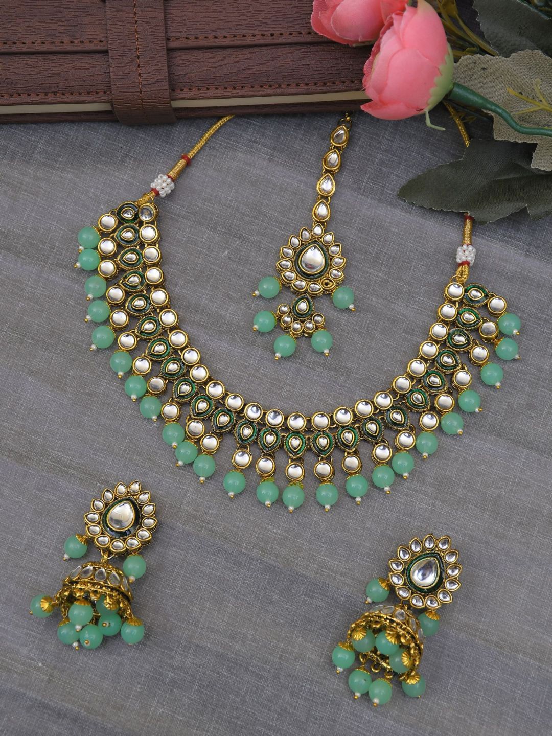 Crunchy Fashion Gold Plated & Kundan Studded Necklace & Earrings With Maang Tika
Crunchy Fashion Gold Plated & Kundan Studded Necklace & Earrings With Maang Tika