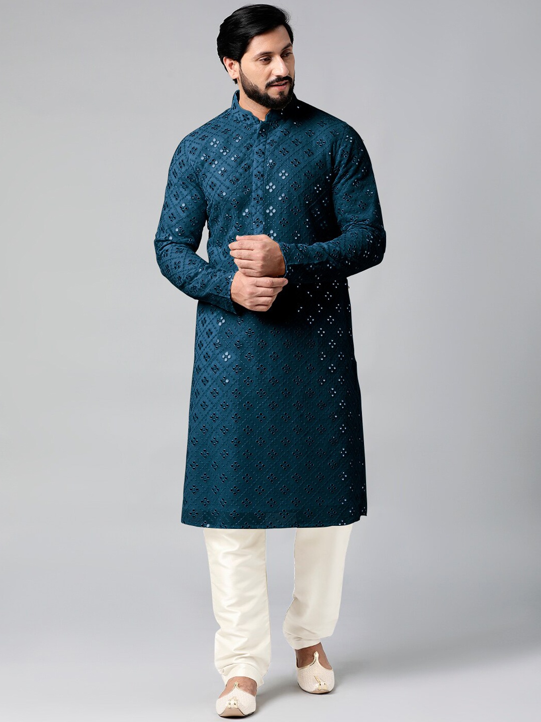 TheEthnic.Co Embroidered Mandarin Collar Mirror Work Georgette Kurta with Pyjamas, Blue
TheEthnic.Co Embroidered Mandarin Collar Mirror Work Georgette Kurta with Pyjamas, Blue