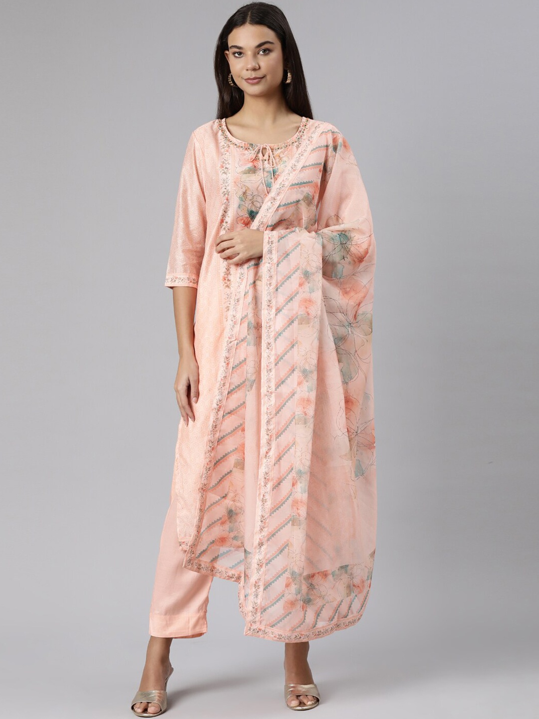 Neerus Floral Printed Tie-Up Neck Beads & Stones Kurta With Trousers & Dupatta, Peach
Neerus Floral Printed Tie-Up Neck Beads & Stones Kurta With Trousers & Dupatta, Peach