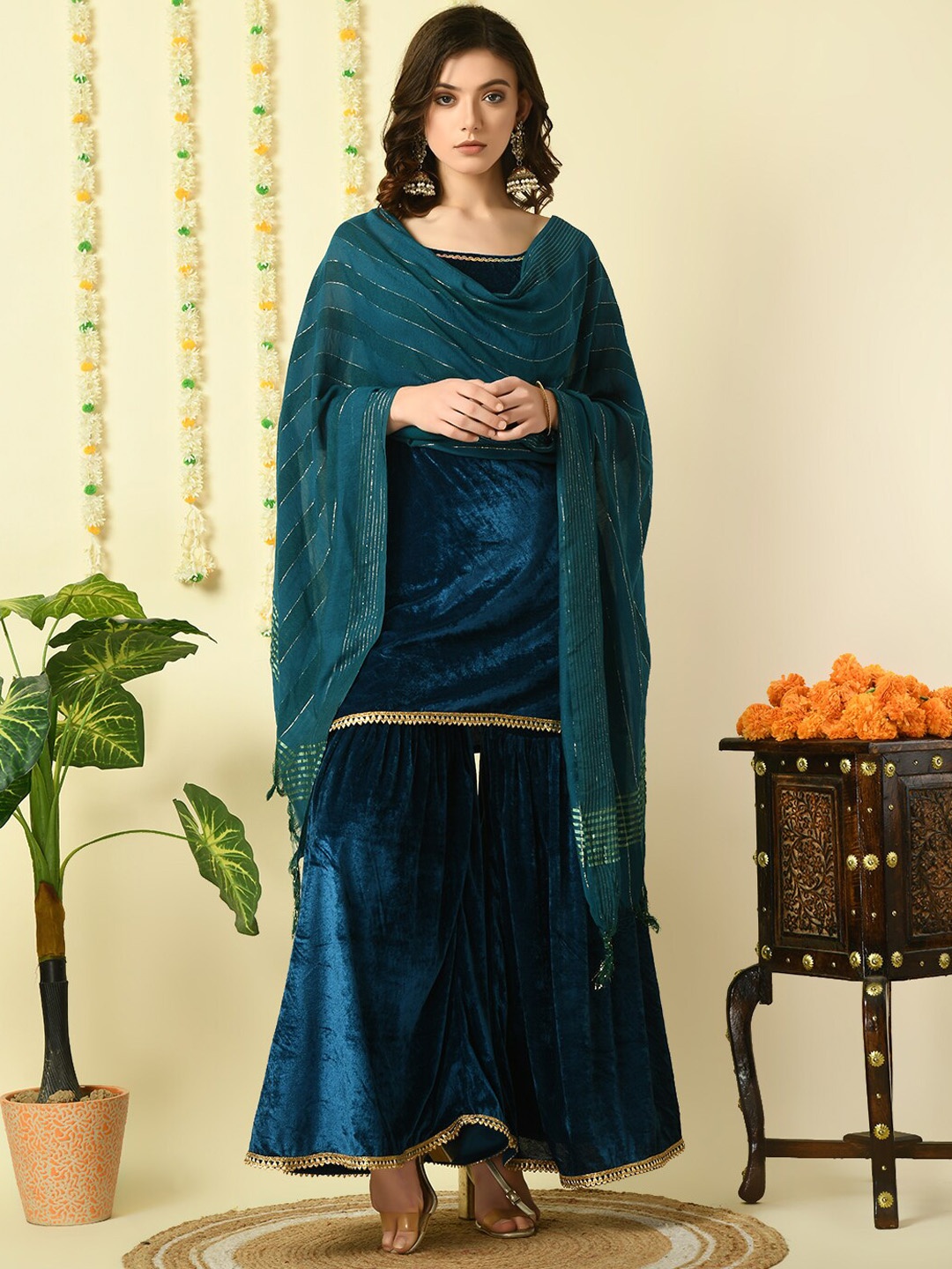 KALINI Shoulder Straps Gotta Patti Sleeveless Velvet Kurti With Sharara & Dupatta, Teal
KALINI Shoulder Straps Gotta Patti Sleeveless Velvet Kurti With Sharara & Dupatta, Teal