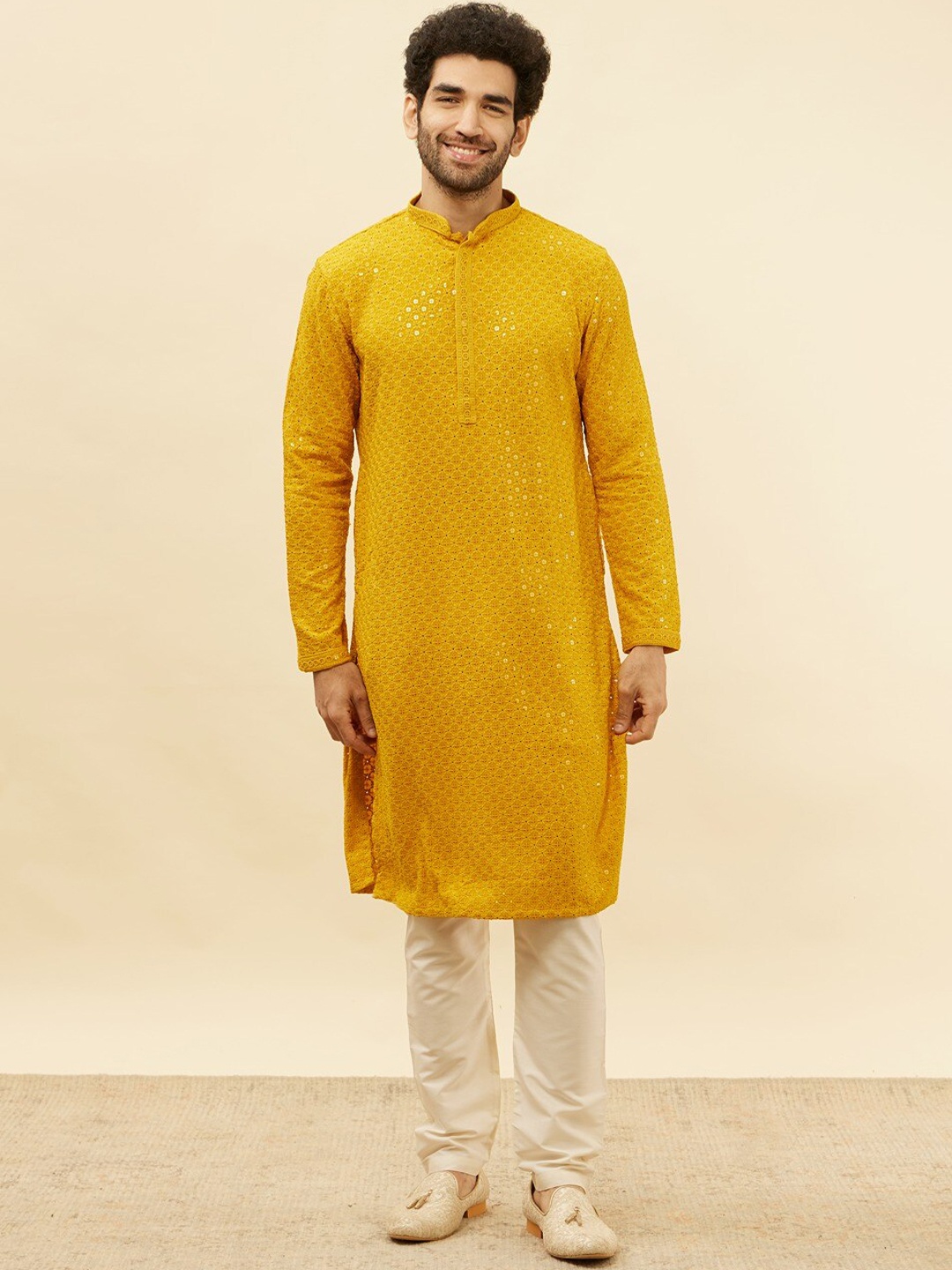 Manyavar Ethnic Motifs Embroidered Chikankari Sequined Regular Kurta with Pyjamas, Mustard
Manyavar Ethnic Motifs Embroidered Chikankari Sequined Regular Kurta with Pyjamas, Mustard