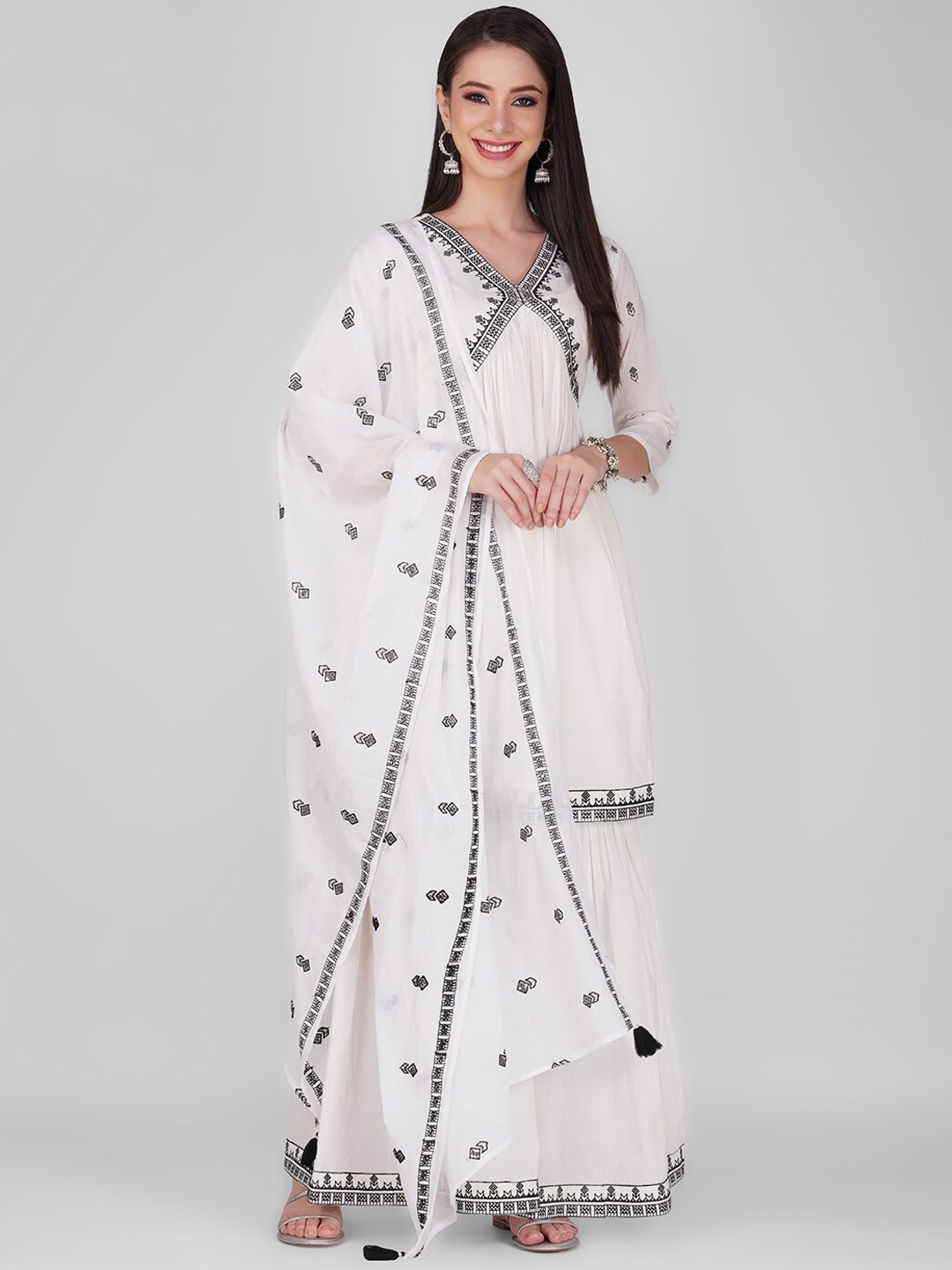 KALINI Floral Yoke Design Thread Work Empire Pure Cotton Kurta With Sharara & Dupatta, White
KALINI Floral Yoke Design Thread Work Empire Pure Cotton Kurta With Sharara & Dupatta, White