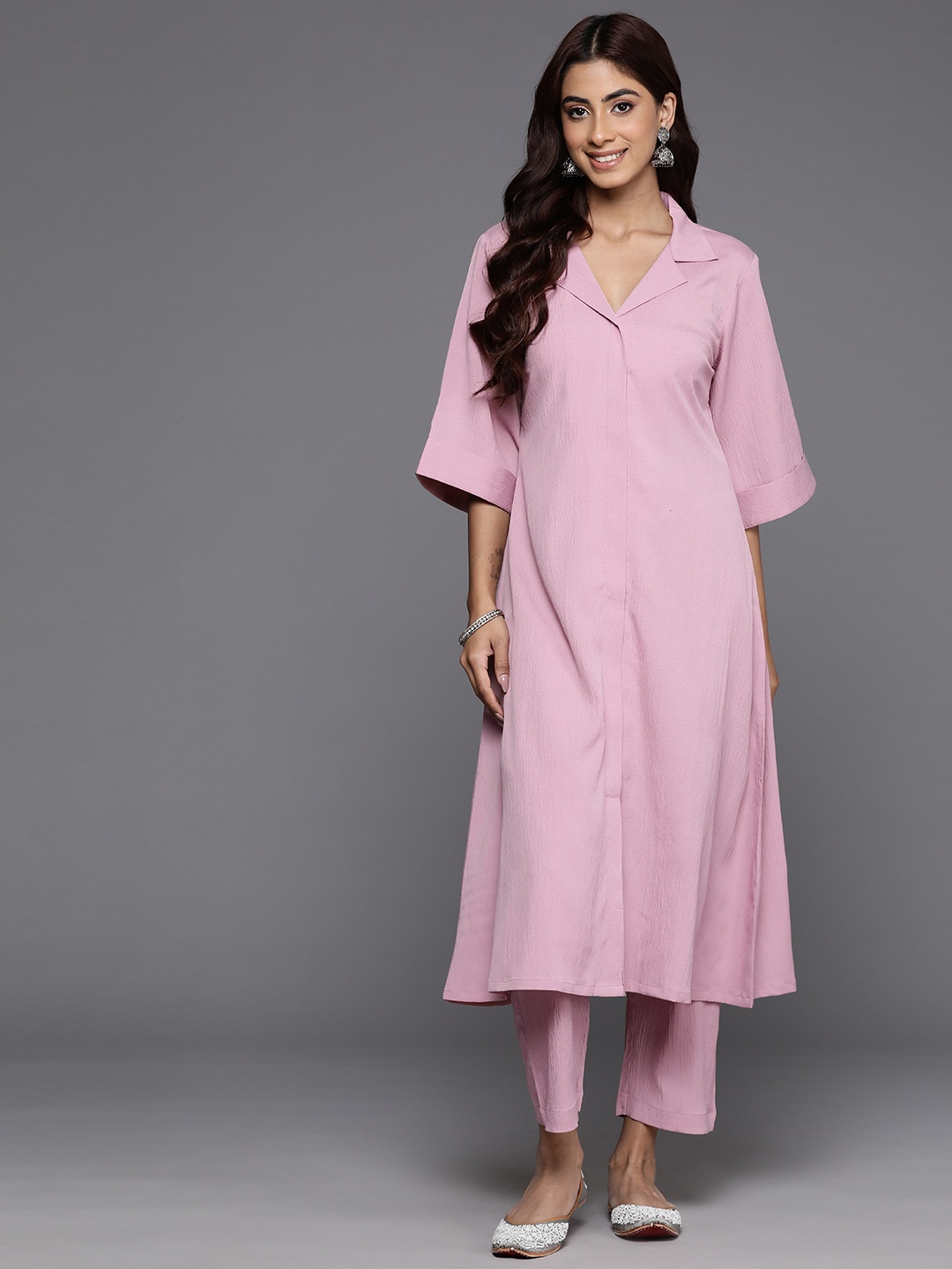 Varanga Women Solid Regular Textured Silk Crepe Shirt collar Kurta with Trousers, Pink
Varanga Women Solid Regular Textured Silk Crepe Shirt collar Kurta with Trousers, Pink