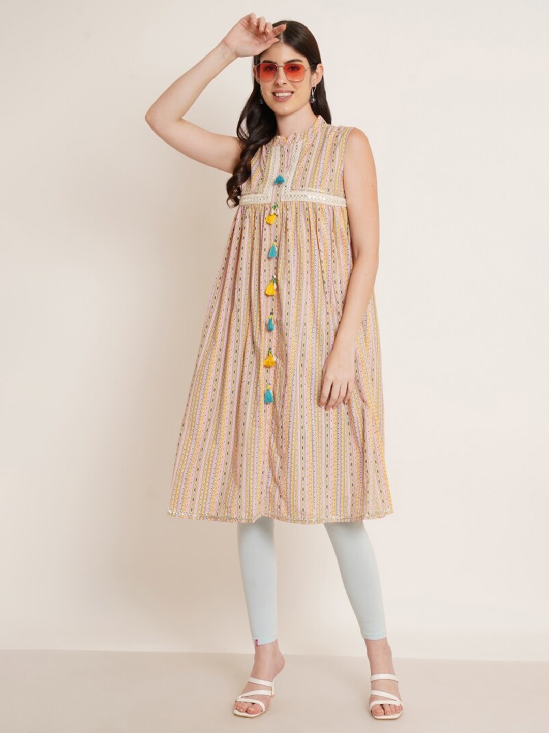 KALINI Ethnic Motifs Printed Mandarin Collar Mirror Work Detailed Cotton A-Line Kurta, Beige
KALINI Ethnic Motifs Printed Mandarin Collar Mirror Work Detailed Cotton A-Line Kurta, Beige