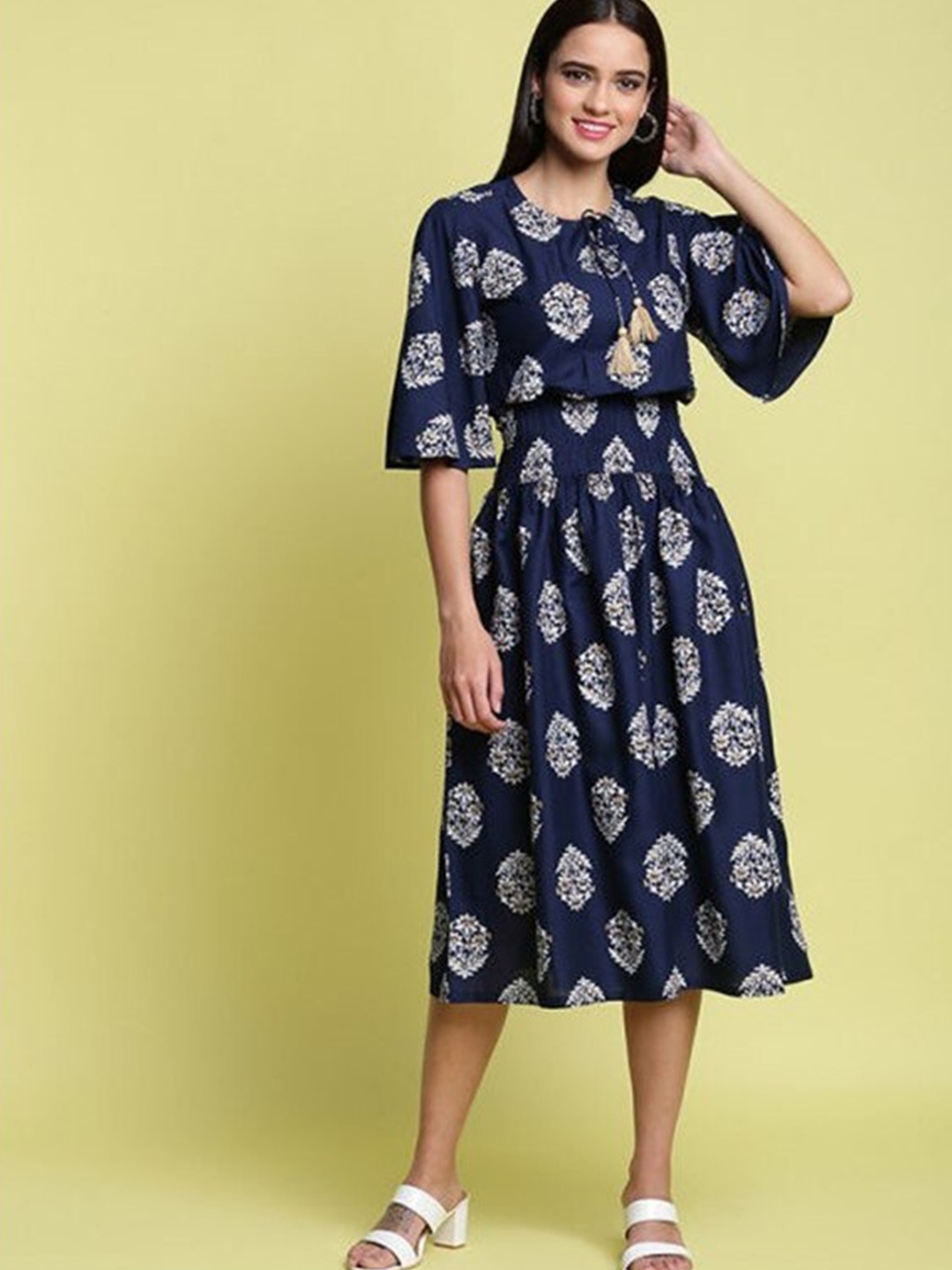 Aila Floral Printed Tie-Up Neck Bell Sleeves Fit & Flare Midi Dress, Navy blue
Aila Floral Printed Tie-Up Neck Bell Sleeves Fit & Flare Midi Dress, Navy blue