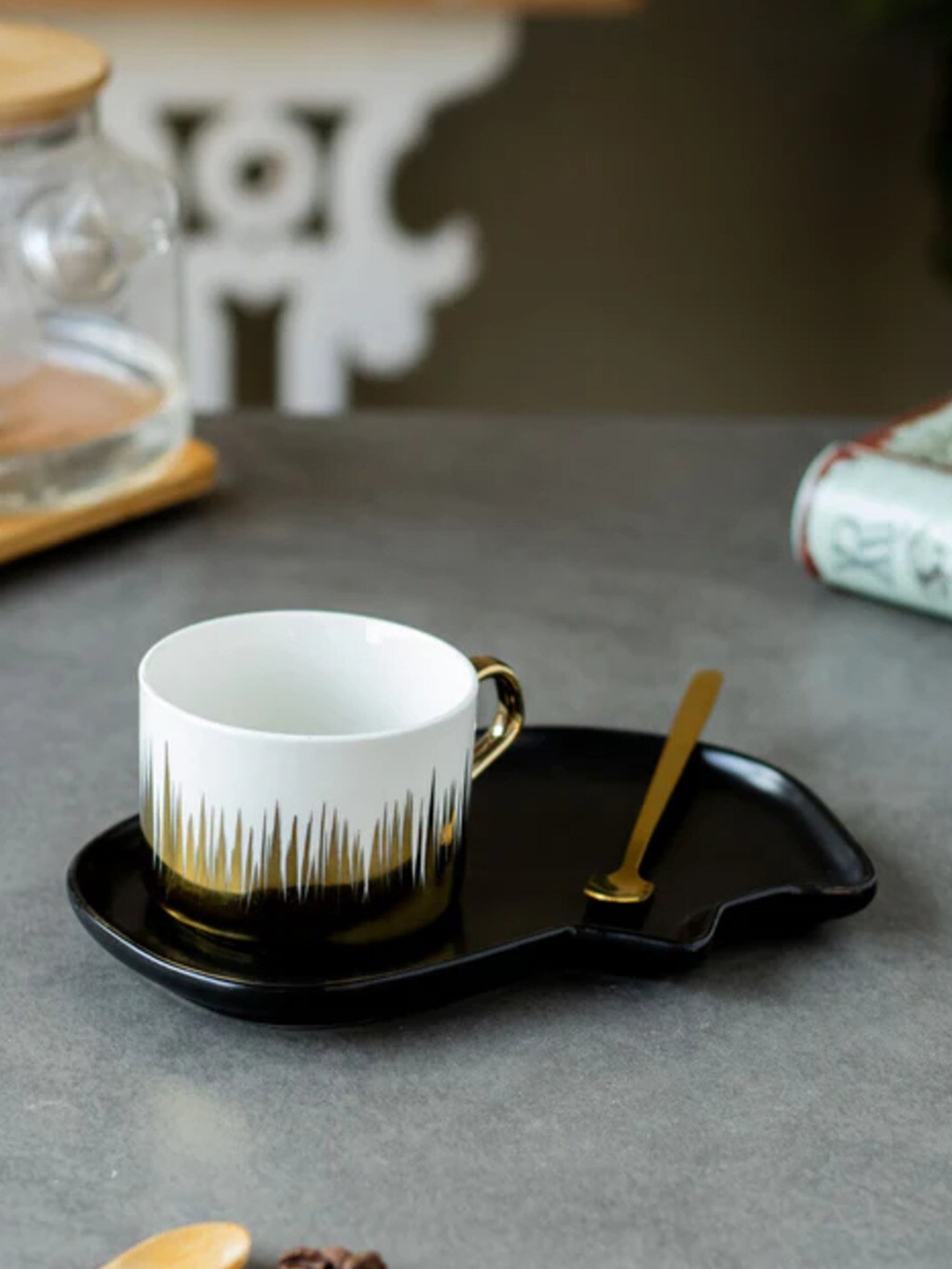 THEDECORKART White & Black 3 Pieces Printed Ceramic Cup and Saucer with Spoon- 300 ML
THEDECORKART White & Black 3 Pieces Printed Ceramic Cup and Saucer with Spoon- 300 ML