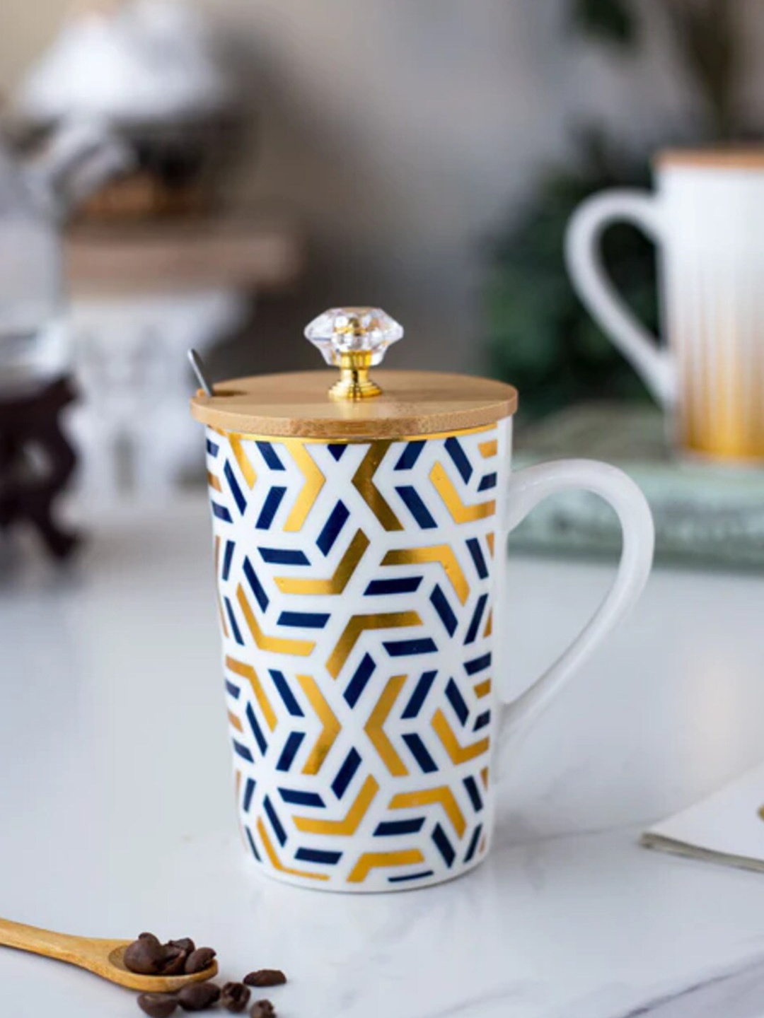 THEDECORKART White & Blue 3 Pieces Geometric Printed Ceramic Mug with Lid & Spoon 300 ml
THEDECORKART White & Blue 3 Pieces Geometric Printed Ceramic Mug with Lid & Spoon 300 ml