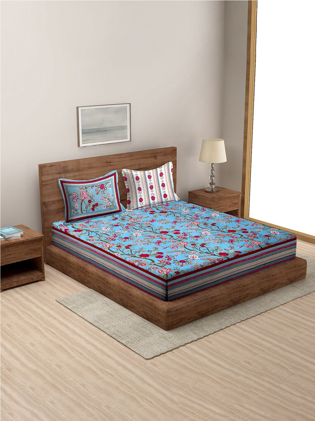 Rajasthan Decor Blue & Red 3 Pcs Floral Cotton 180 TC King Bedsheet with Pillow Covers
Rajasthan Decor Blue & Red 3 Pcs Floral Cotton 180 TC King Bedsheet with Pillow Covers